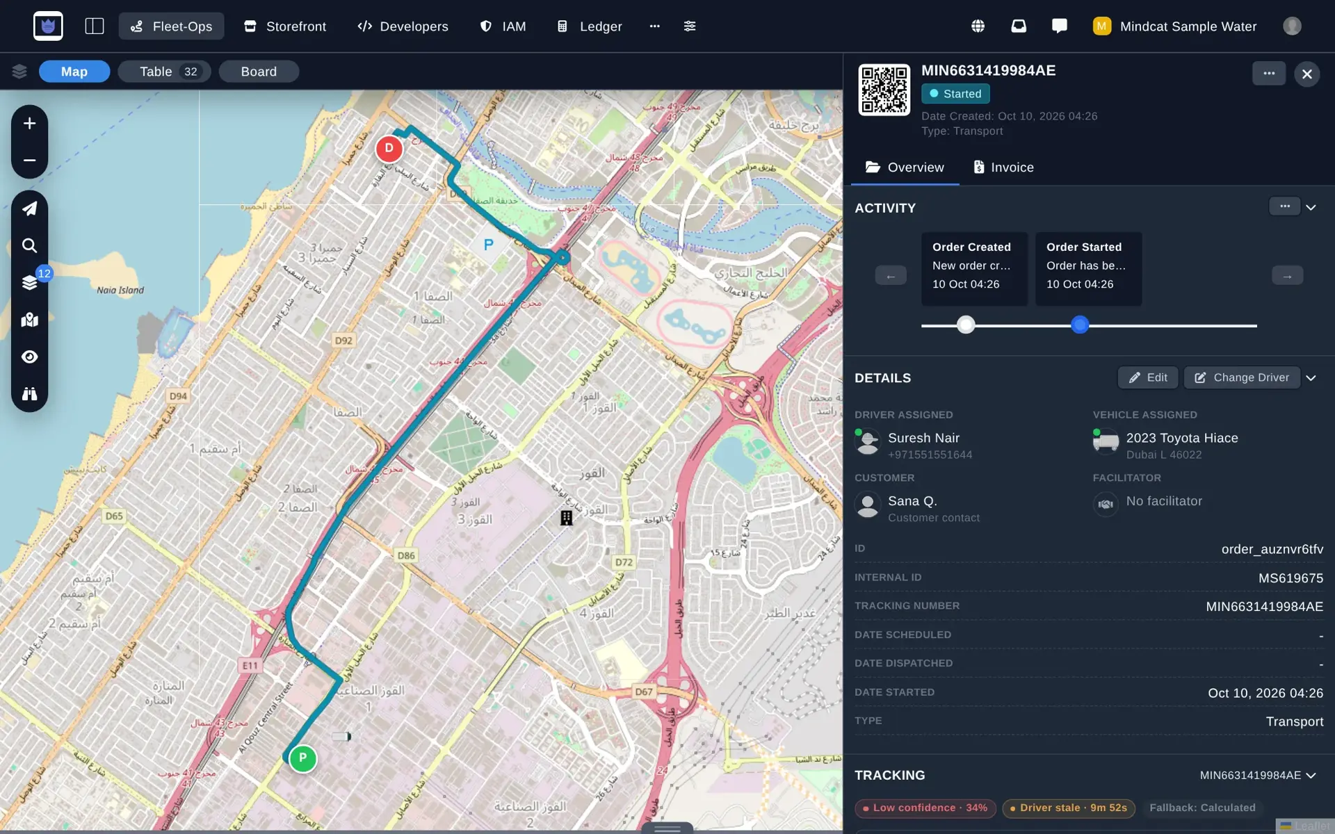 Order detail with a QR code and tracking number, status Started, the route drawn from Al Quoz to Al Safa on the map, driver Suresh Nair, a 2023 Toyota Hiace with plate Dubai L 46022, and the customer.